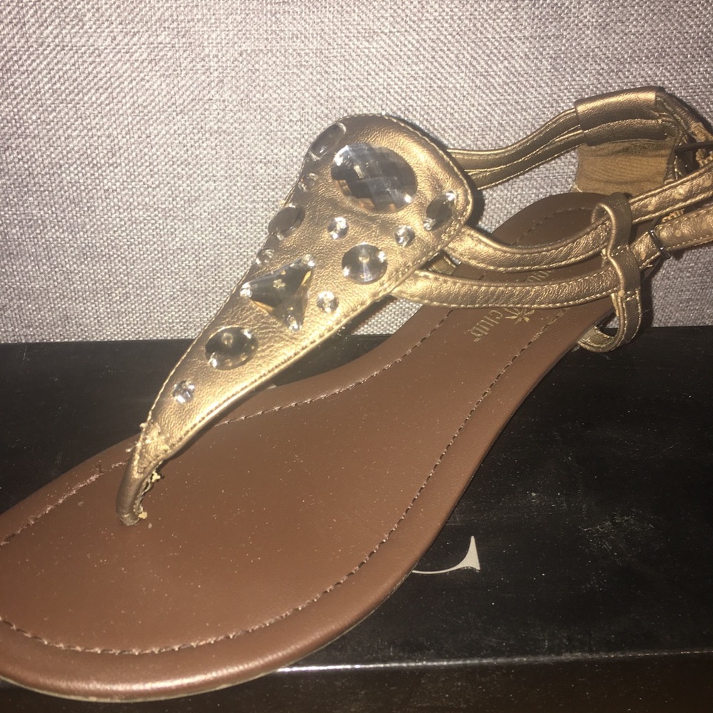 Gold sandal with small wedge